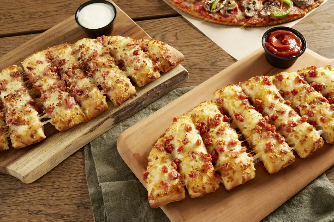 Donatos introduces its new Pepperoni Cheese Bread and Bacon Cheese Bread available for a limited time for just $6 with the purchase of any large or medium pizza online. img#2
