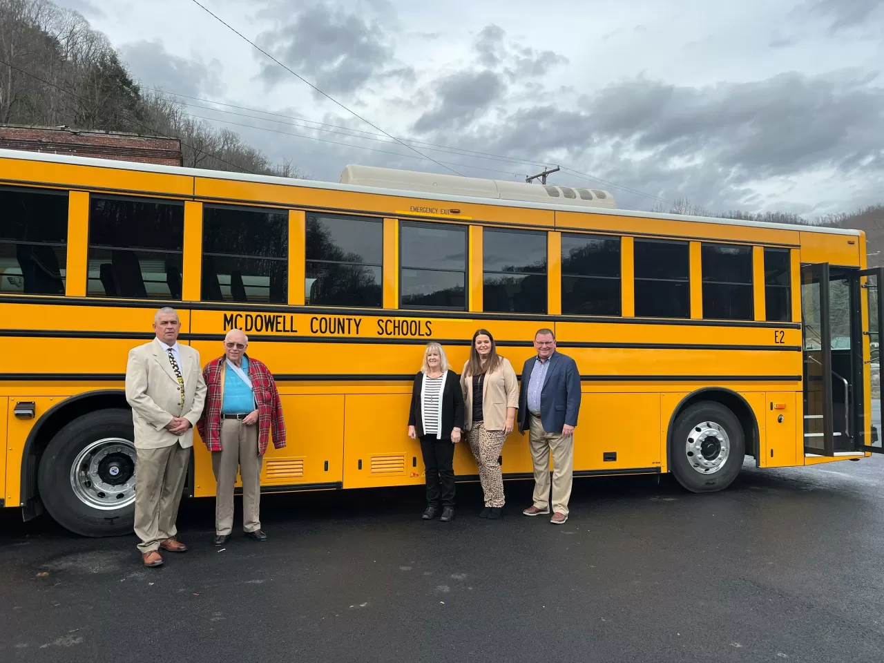 McDowell County Schools taking delivery of a GreenPower BEAST all-electric purpose-built school bus. In the photo are Adam Grygiel, Director of Transportation; Mike Callaway, Board of Education President; Georgia West, img#1