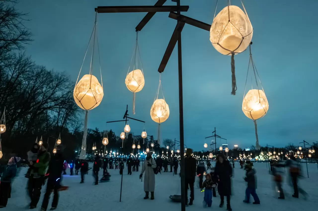 One of The Great Northern festival's cornerstone events is the Luminary Loppet, a magical nighttime experience where participants cross-country ski on Lake of the Isles in Minneapolis, img#1