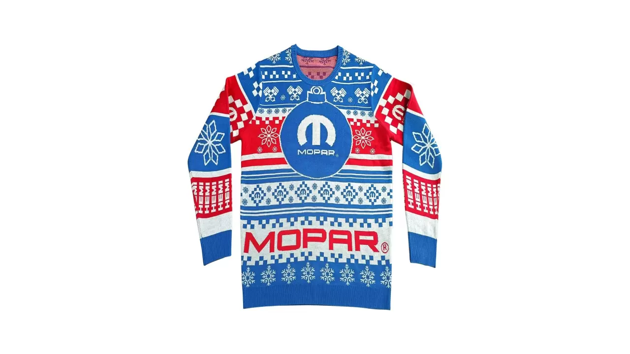 Celebrate the holiday season with a traditional Mopar ugly sweater that embraces the performance-car theme. This medium-weight knit sweater features Mopar logos integrated into a custom graphic design. Online price $79.95 img#1