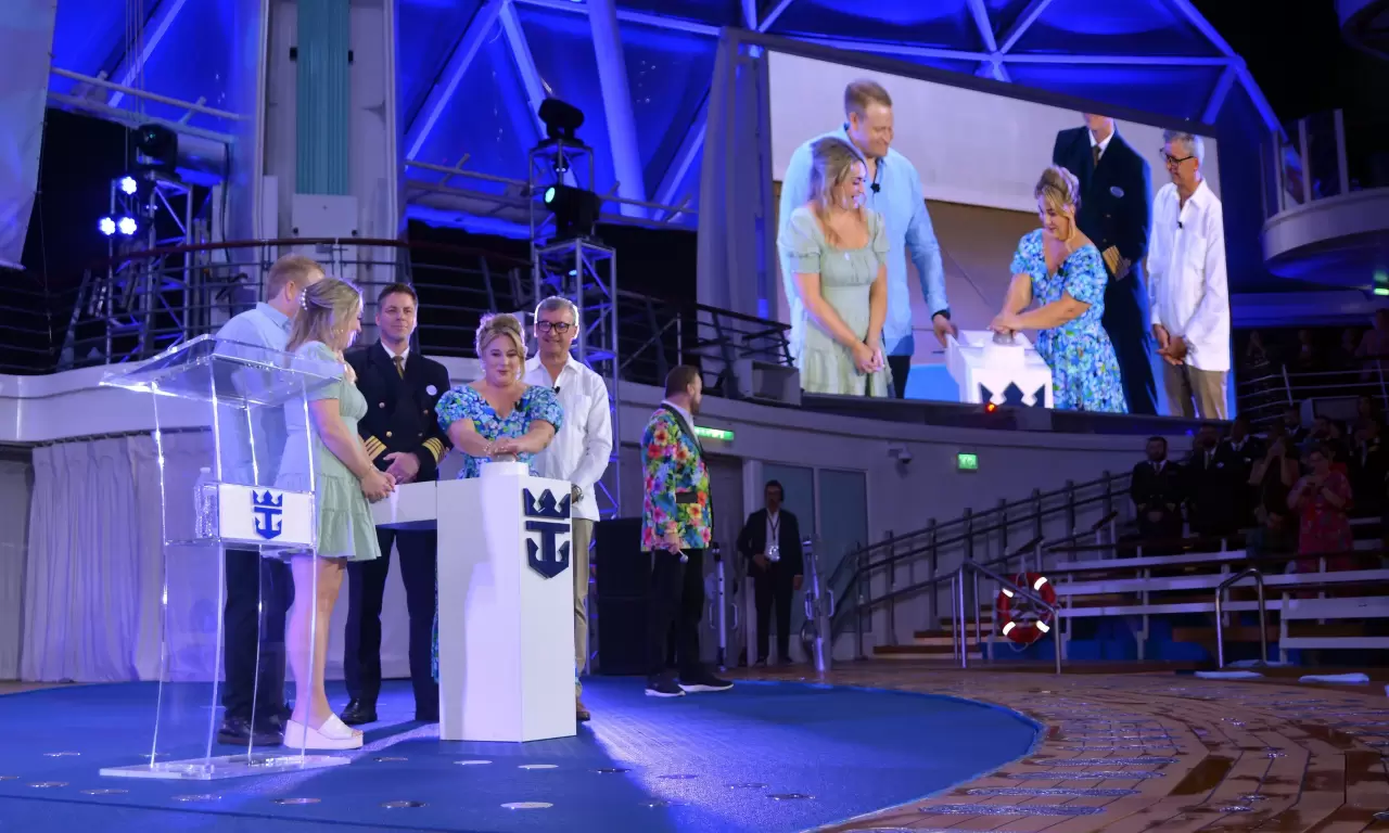 Godmother and Wonder Mom from Pennsylvania Marie McCrea bestowed a blessing of safekeeping on the new ship, its crew and all who sail on it. In the one-of-a-kind AquaTheater, she was joined by Royal Caribbean Group President img#3