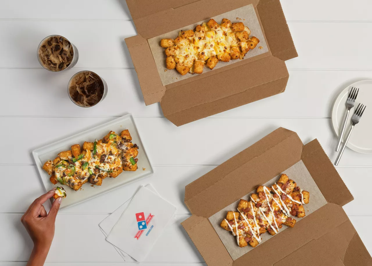 Domino’s Loaded Tots come in three varieties: Philly Cheese Steak, Melty 3-Cheese and Cheddar Bacon. img#1