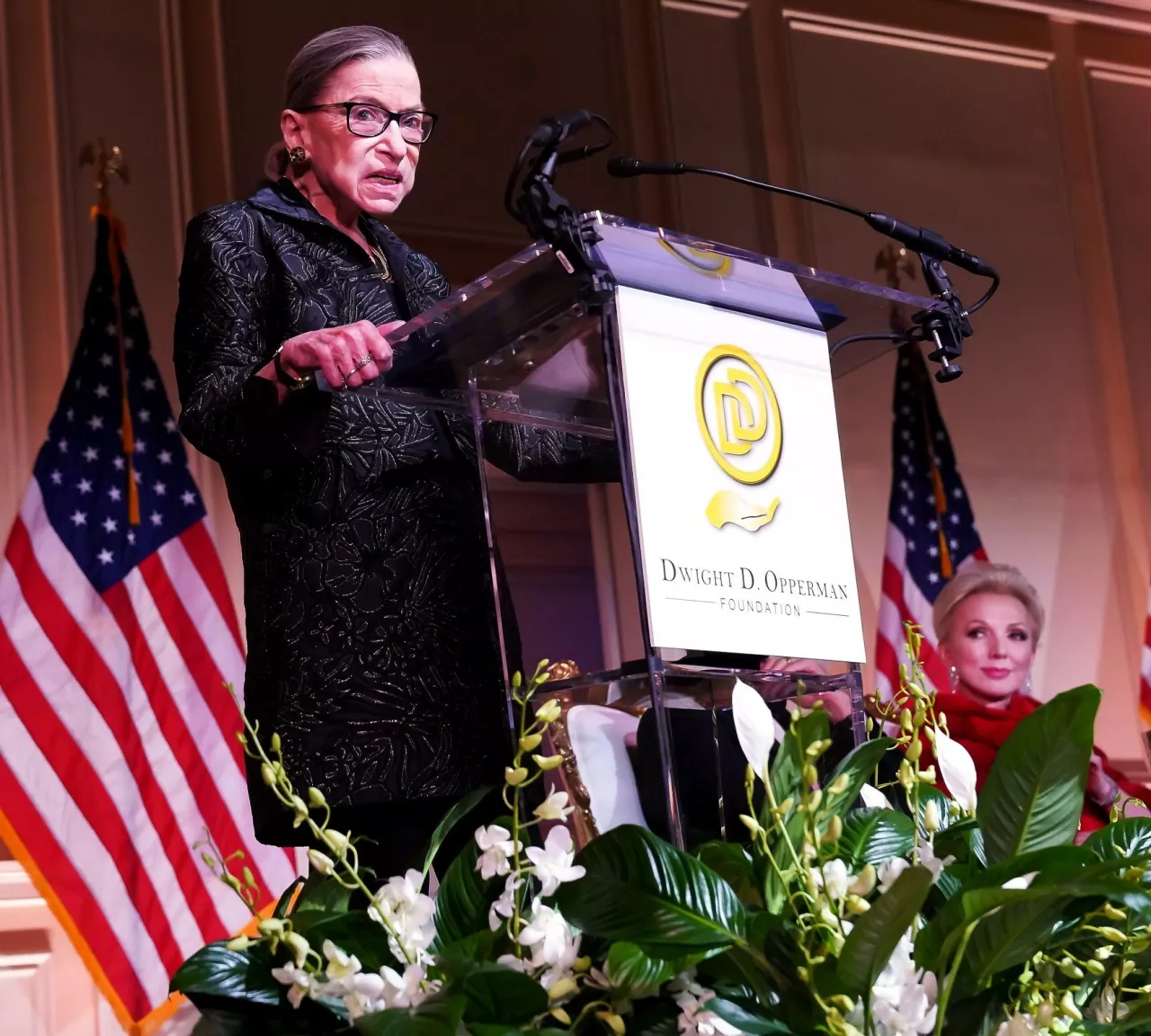 Ruth Bader Ginsburg, speaking at the inaugural Justice Ruth Bader Ginsburg Woman in Leadership awards ceremony in 2020, with Julie Opperman, of the Dwight D. Opperman Foundation, looking on. (RBG Award) img#2