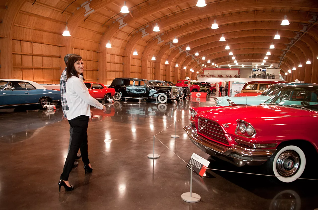A couple strolls down a nostalgic Memory Lane at LeMay - America's Car Museum in Tacoma, Washington. img#1