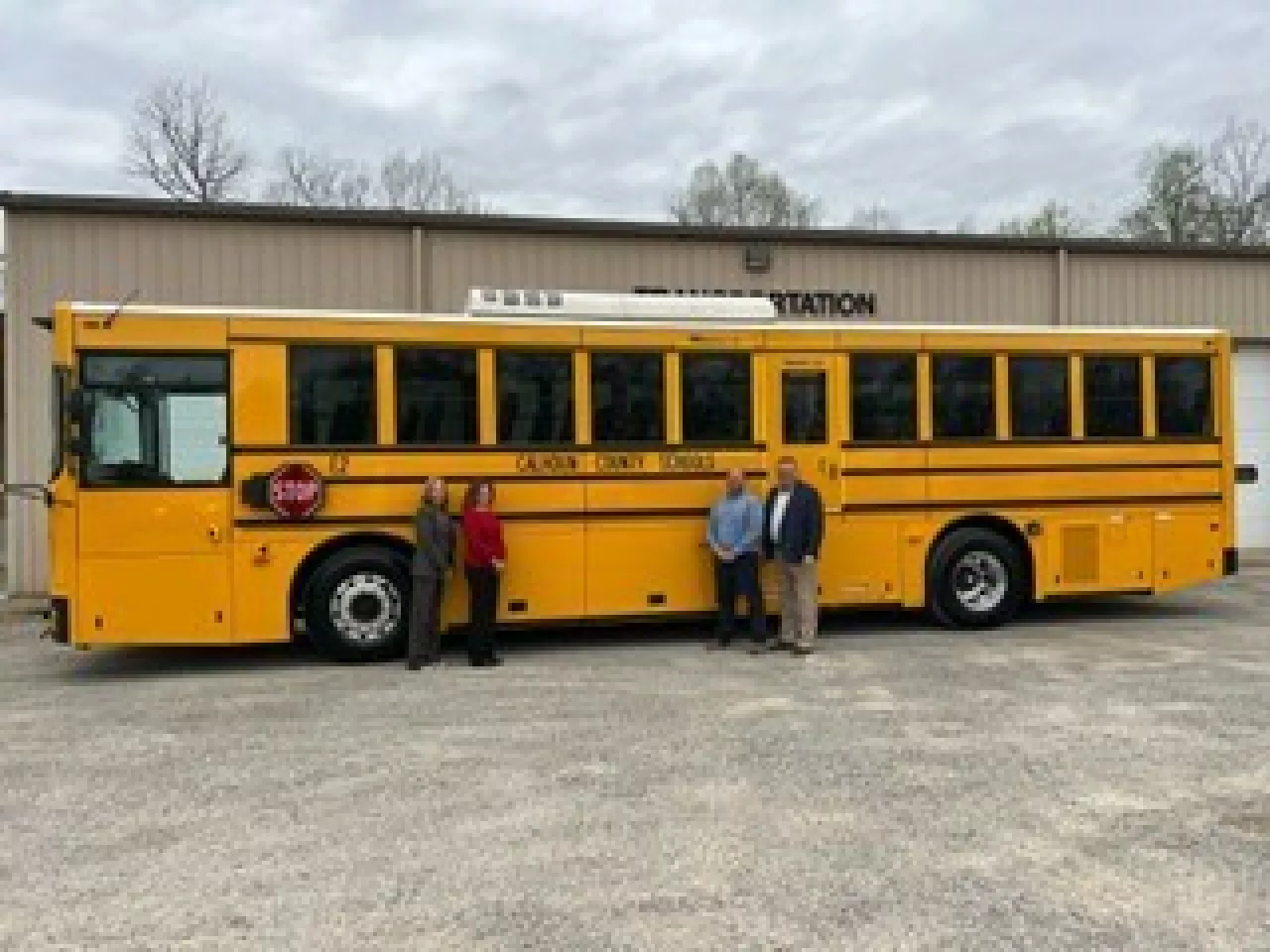 Calhoun County Schools taking delivery of a GreenPower BEAST all-electric purpose-built school bus. In the photo are Kelli Whytsell, Superintendent; Jenna Jett, Board of Education President; Michael Fitzwater, Assistant Superintendent and GreenPower Motor Vice President Mark Nestlen img#4