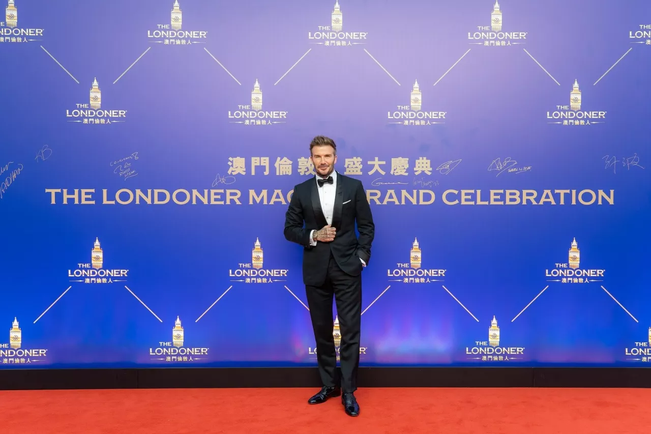 UK soccer icon and Sands Resorts Macao brand ambassador David Beckham stops at the red carpet during The Londoner Macao Grand Celebration event at The Londoner Arena Thursday. (Sands China Ltd.) img#2