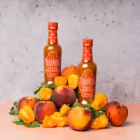 Tabañero Launches Peach Bourbon Hot Sauce in Walmart img#1